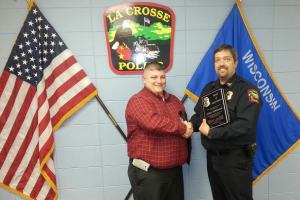 Retired Reserve Commander Adam Wohlwend and Chief Ron Tischer.